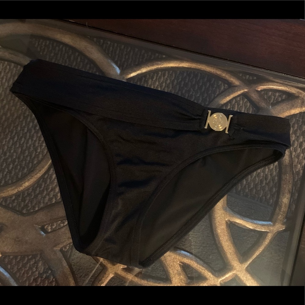 Black Victoria’s Secret bikini bottoms